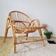 Vintage adult rattan armchair from the 1960s.