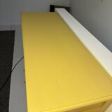 Yellow wooden chest of drawers