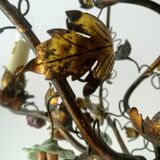 Brass chandelier and porcelain flowers