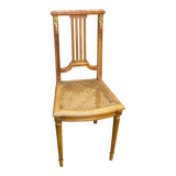 Vintage caned Louis XVI chair in solid gold wood.