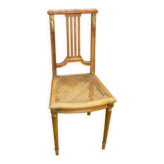 Vintage caned Louis XVI chair in solid gold wood.
