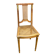 Vintage caned Louis XVI chair in solid gold wood.
