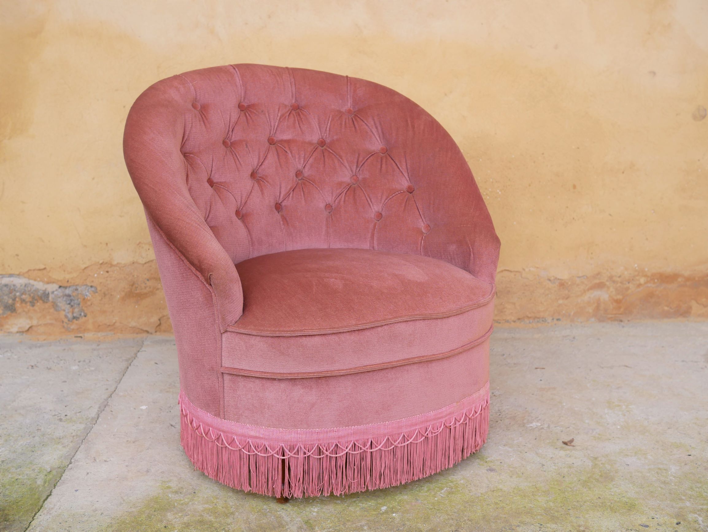 Old pink vintage padded "toad" chair