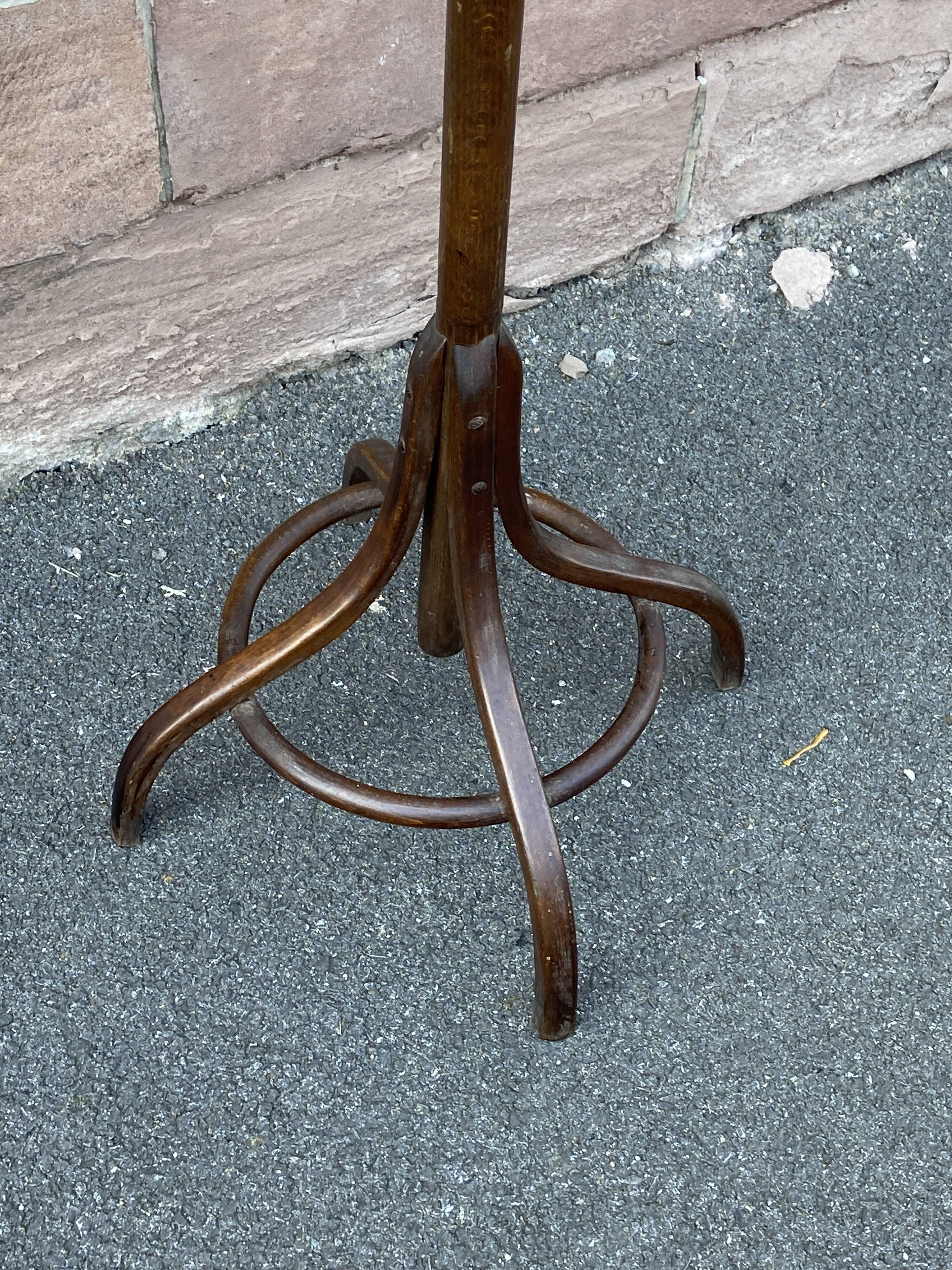 Baumann coat rack on vintage parrot stand