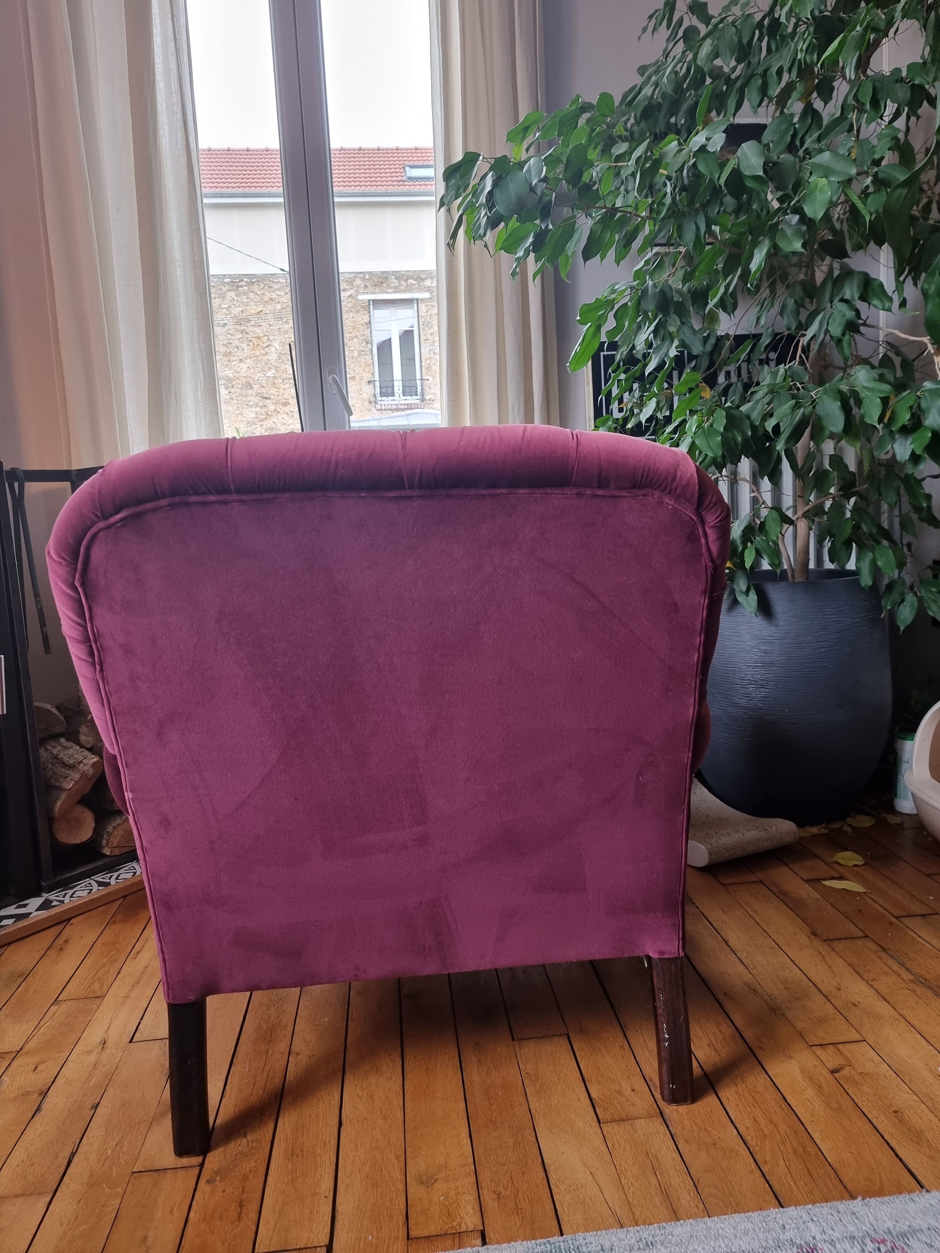 Upholstered velvet armchair