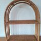 Rattan wall shelf