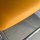 LM vintage chrome and orange/mustard yellow faux leather chairs