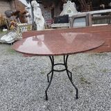 Round marble table with wrought iron base from the mid-20th century.