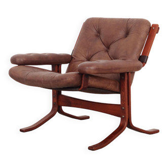 Le fauteuil a été fabriqué dans les années 1970