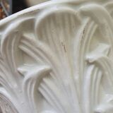 Important white earthenware pot cache with leafy decoration