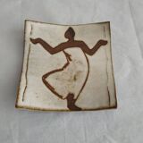 Two terracotta bowls with ethnic decoration and vintage signature.