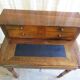 Old-tiered walnut desk
