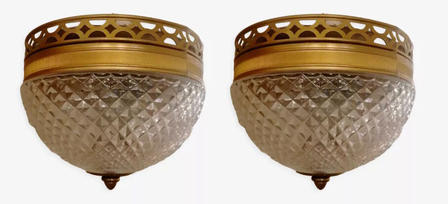 Pair of faceted glass ceiling lights and brass strapping, 1950.