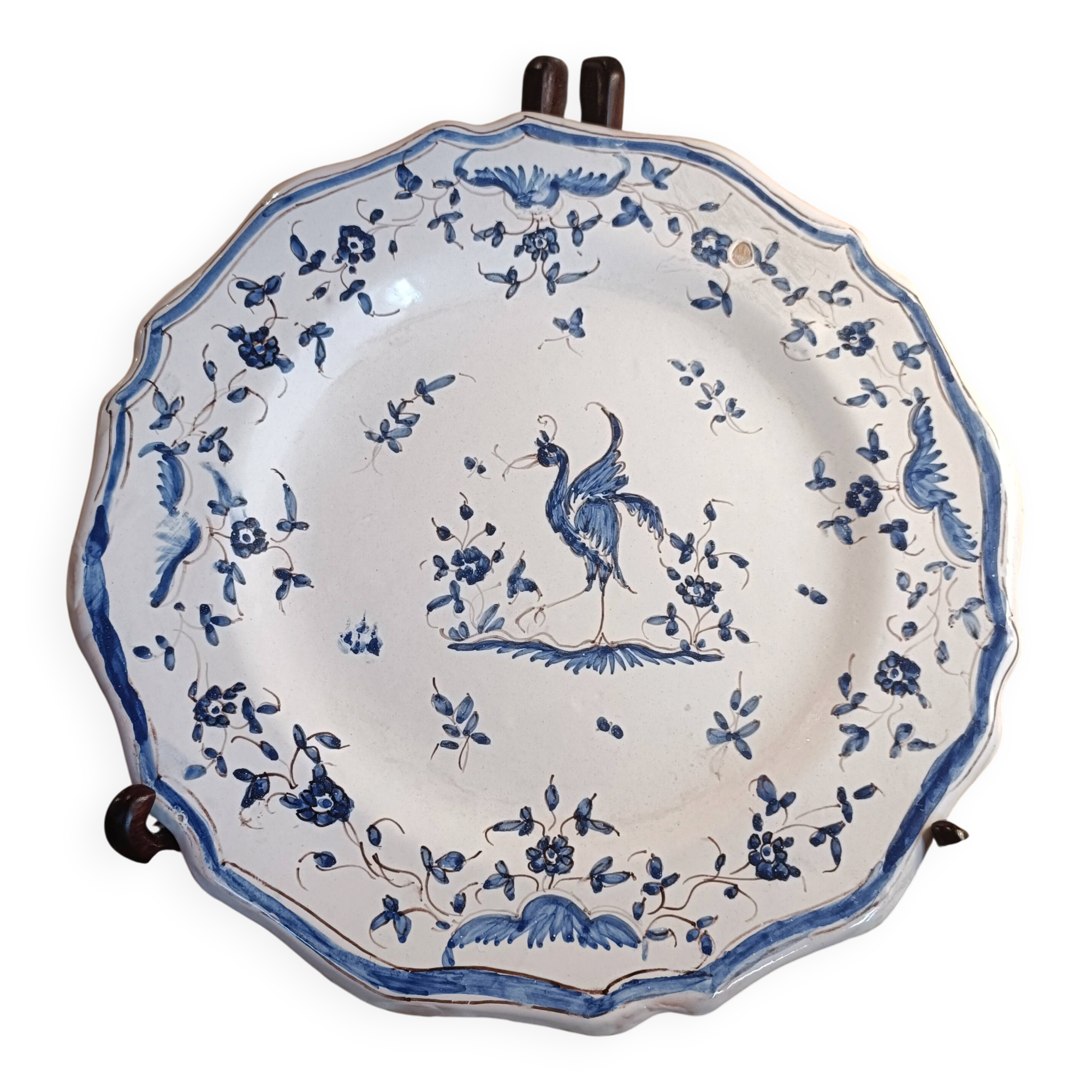 Old Moustiers faience plate blue and white with blue ibis decoration.