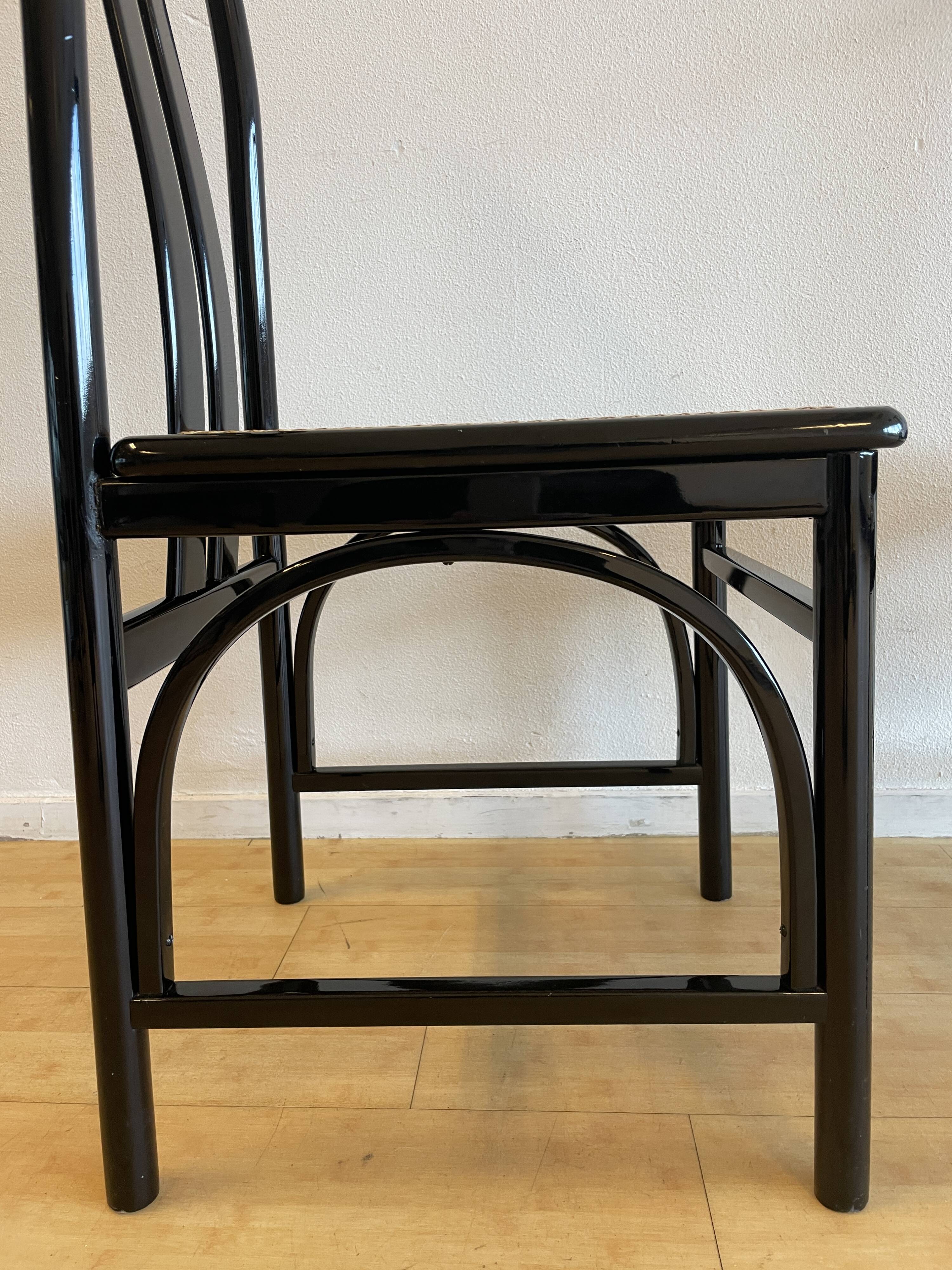 Set of 6 black lacquered and cane chairs by Montina s.p.a.
