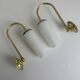 A pair of vintage opaline and brass wall lights