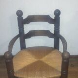Low oak and straw armchair 1940