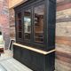 Two-piece cabinet in solid cherry wood