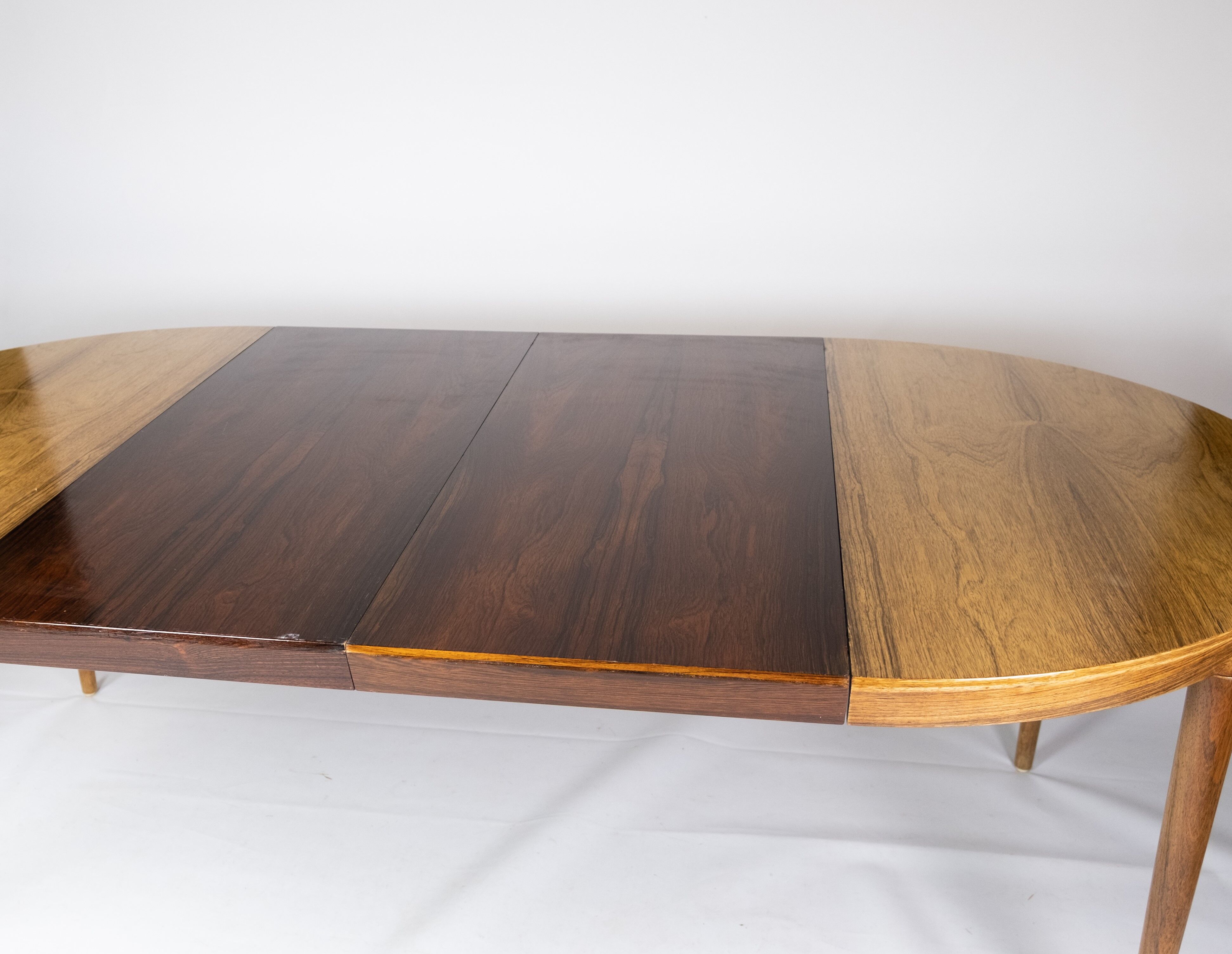 Dining table in rosewood of danish design from the 1960s.