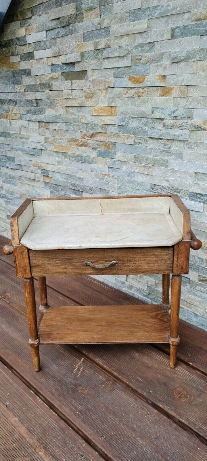 Old wooden children's toilet table and marble top