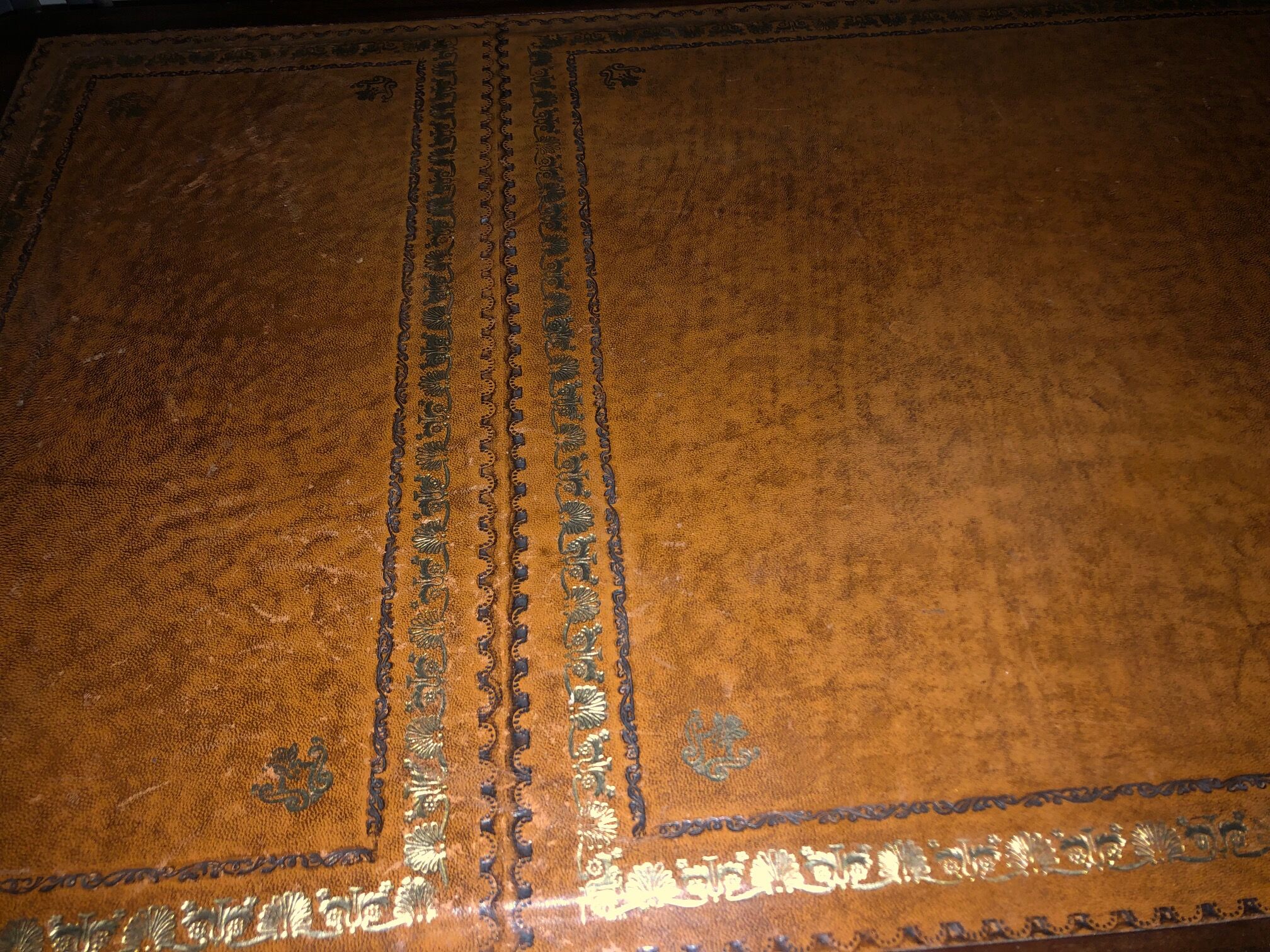 Antique mahogany desk with leather top