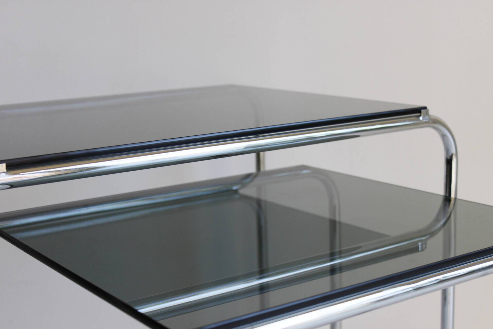 Tubular steel and smoked glass side tables, set of 2