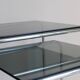 Tubular steel and smoked glass side tables, set of 2