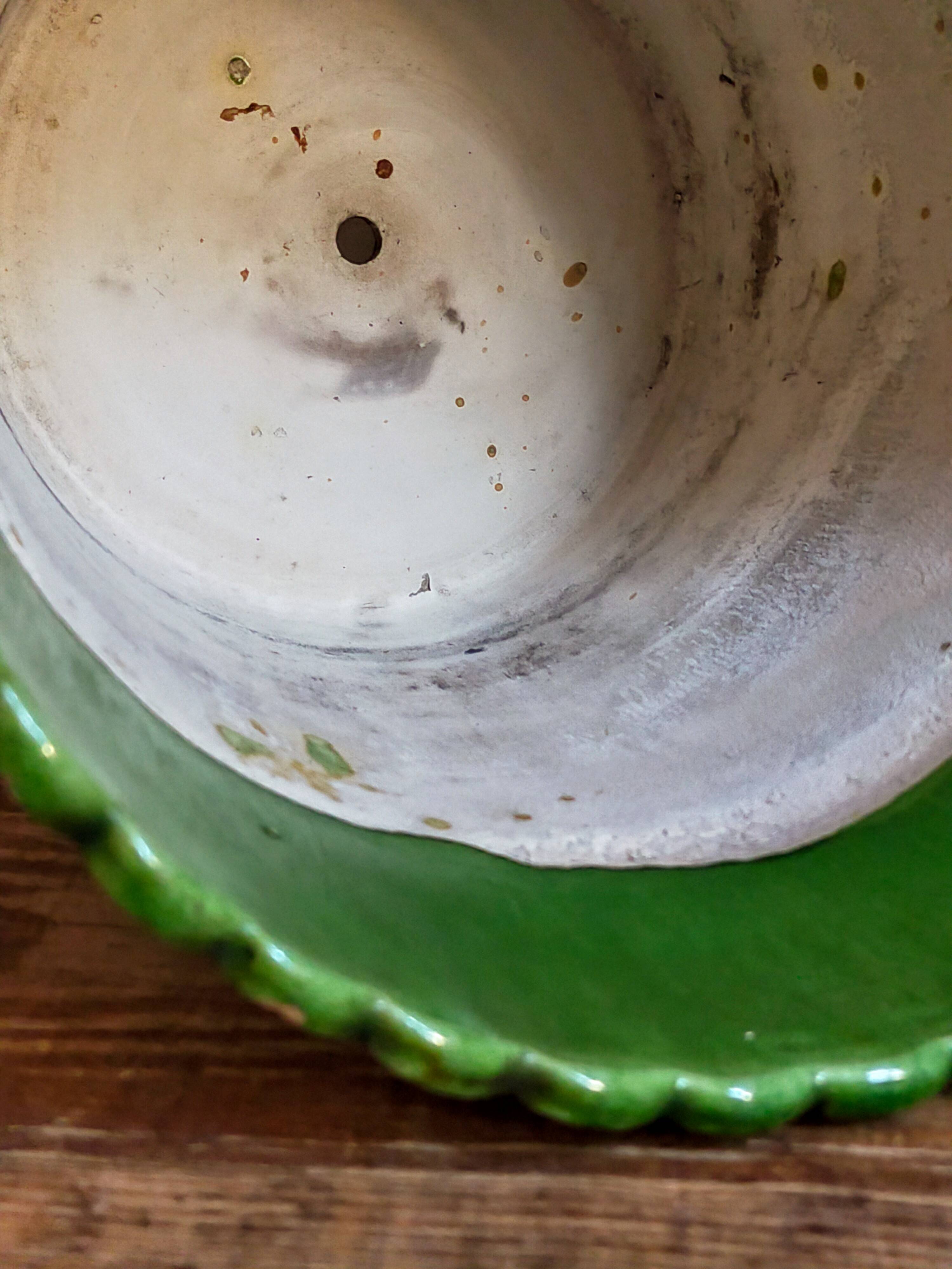 Flower pot and saucer in slip by G. De Bruyn 19th century