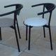 6 gondola-style chairs with a metal structure for indoor and outdoor use.