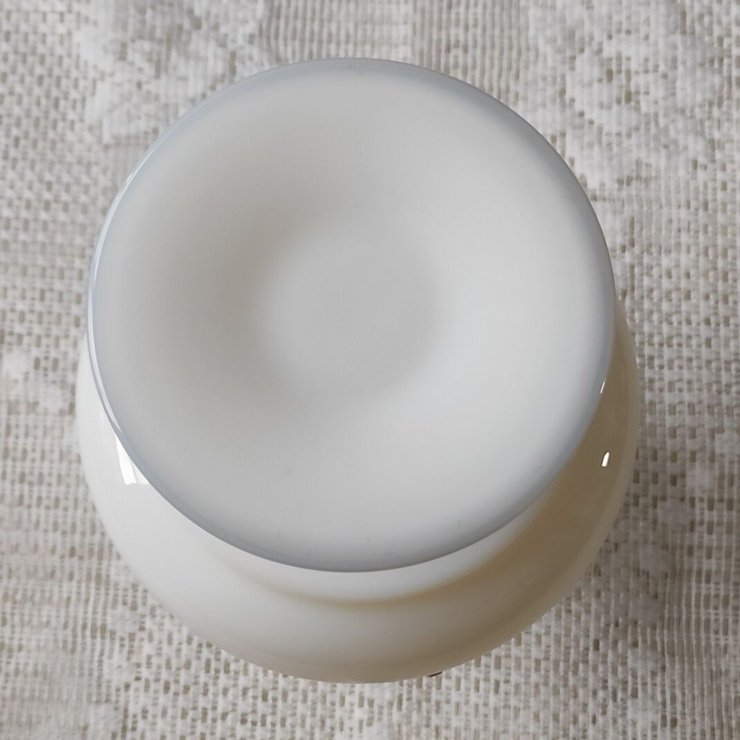 White opaline vase decorated with roses
