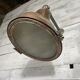 Wall lamp in copper and brass