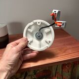 Tilting wall light in green opaline and ceramic