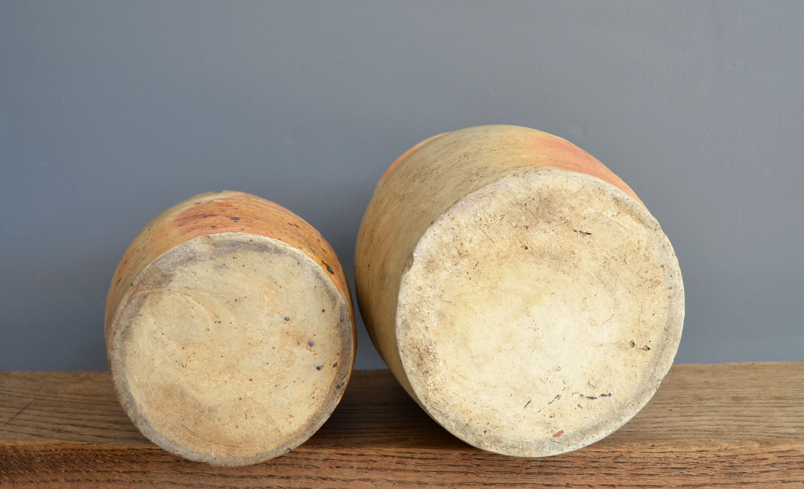 two jugs - old pots in matt sandstone