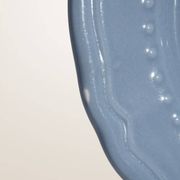 Set of 4 blue ceramic dessert plates.