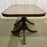 1950s English Regency walnut table with 1 extension leaf