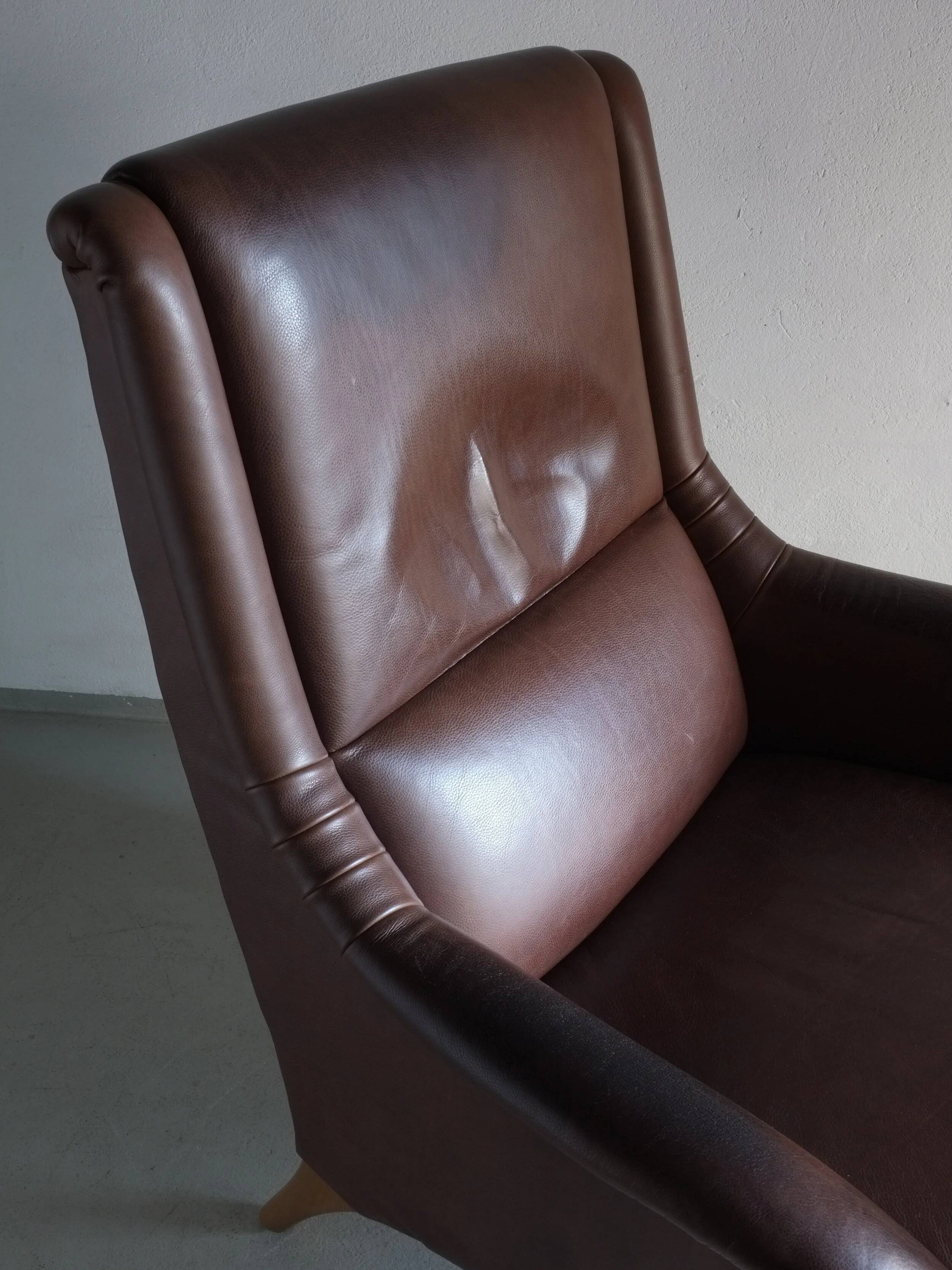 Brown leather lounge chair | Netherlands | 1980s