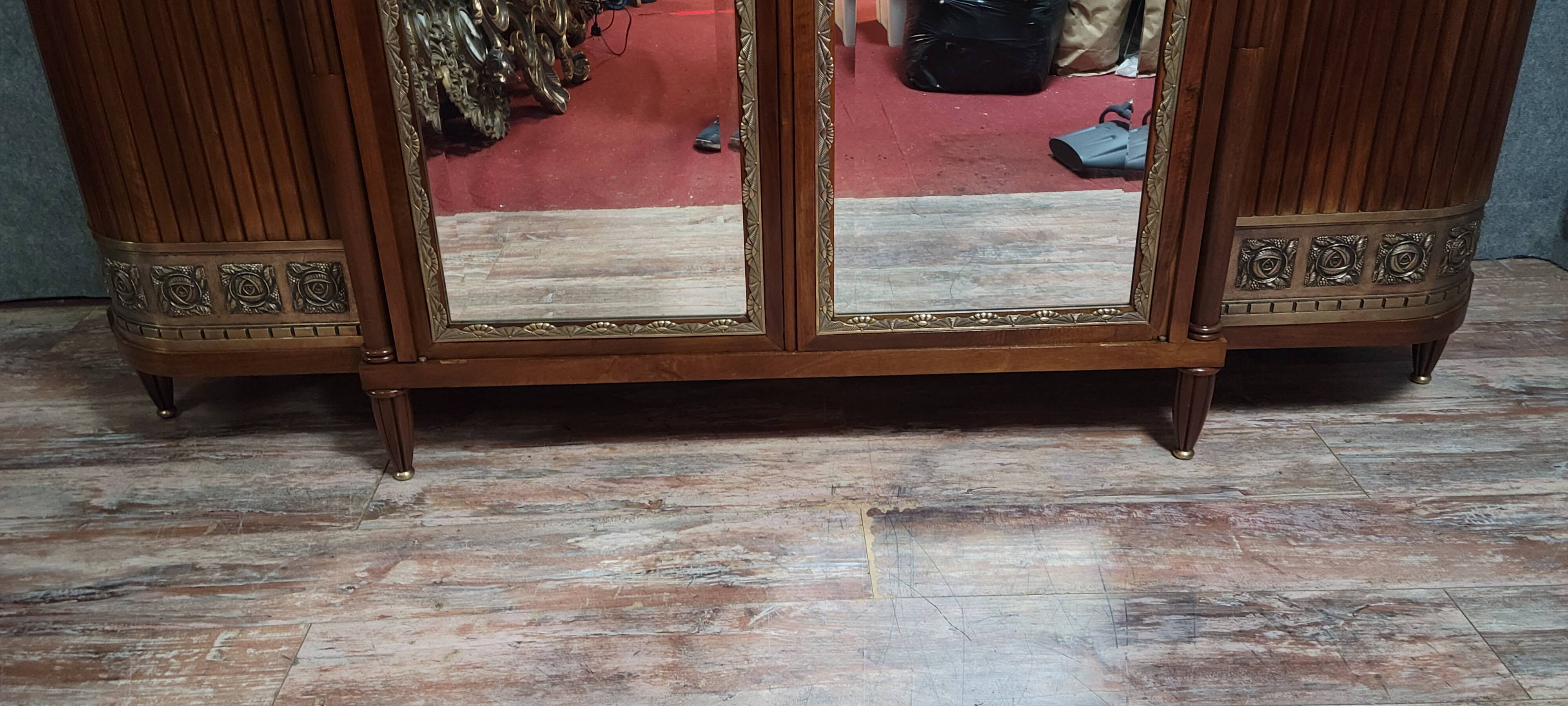 Large Art Deco bookcase wardrobe in mahogany and bronze.