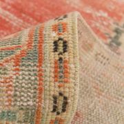 Tapis vintage rouge pâle