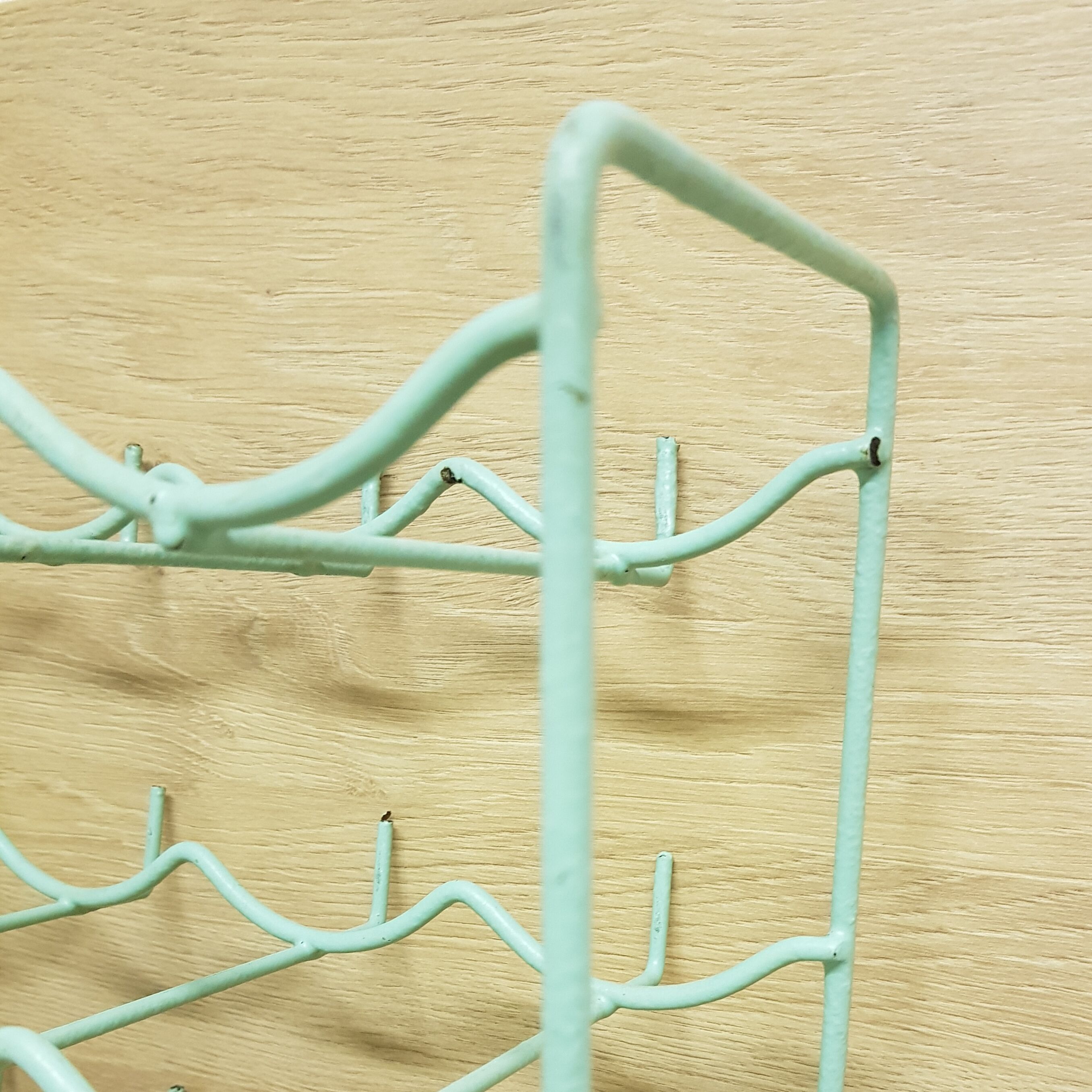 Metal aqua green bottle rack