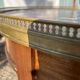 Mahogany hot water bottle table with brass net