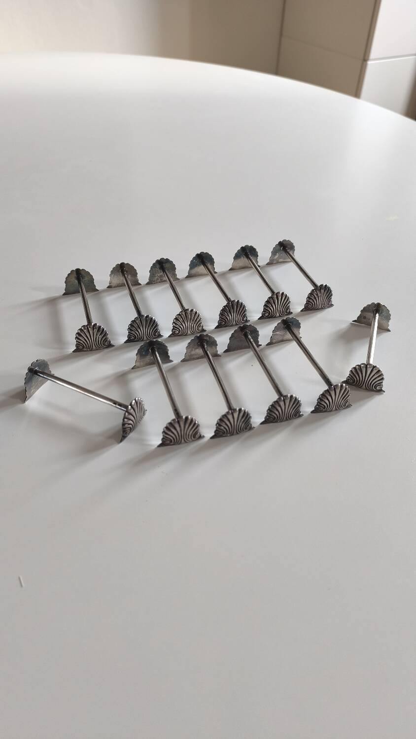 Set of 12 solid silver knife holders