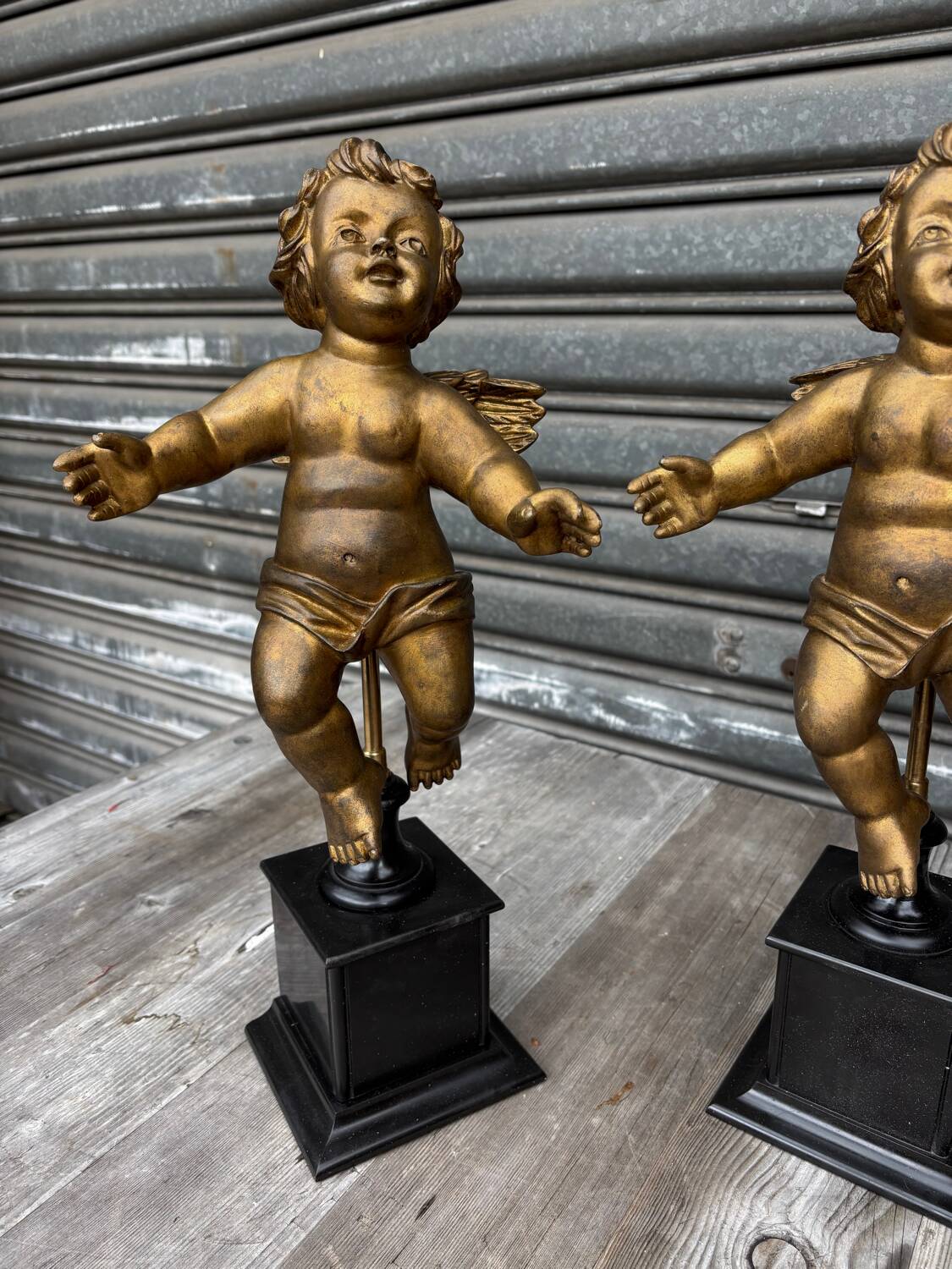 Pair of gilded cherubs on a Napoléon III base