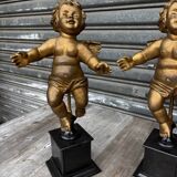 Pair of gilded cherubs on a Napoléon III base