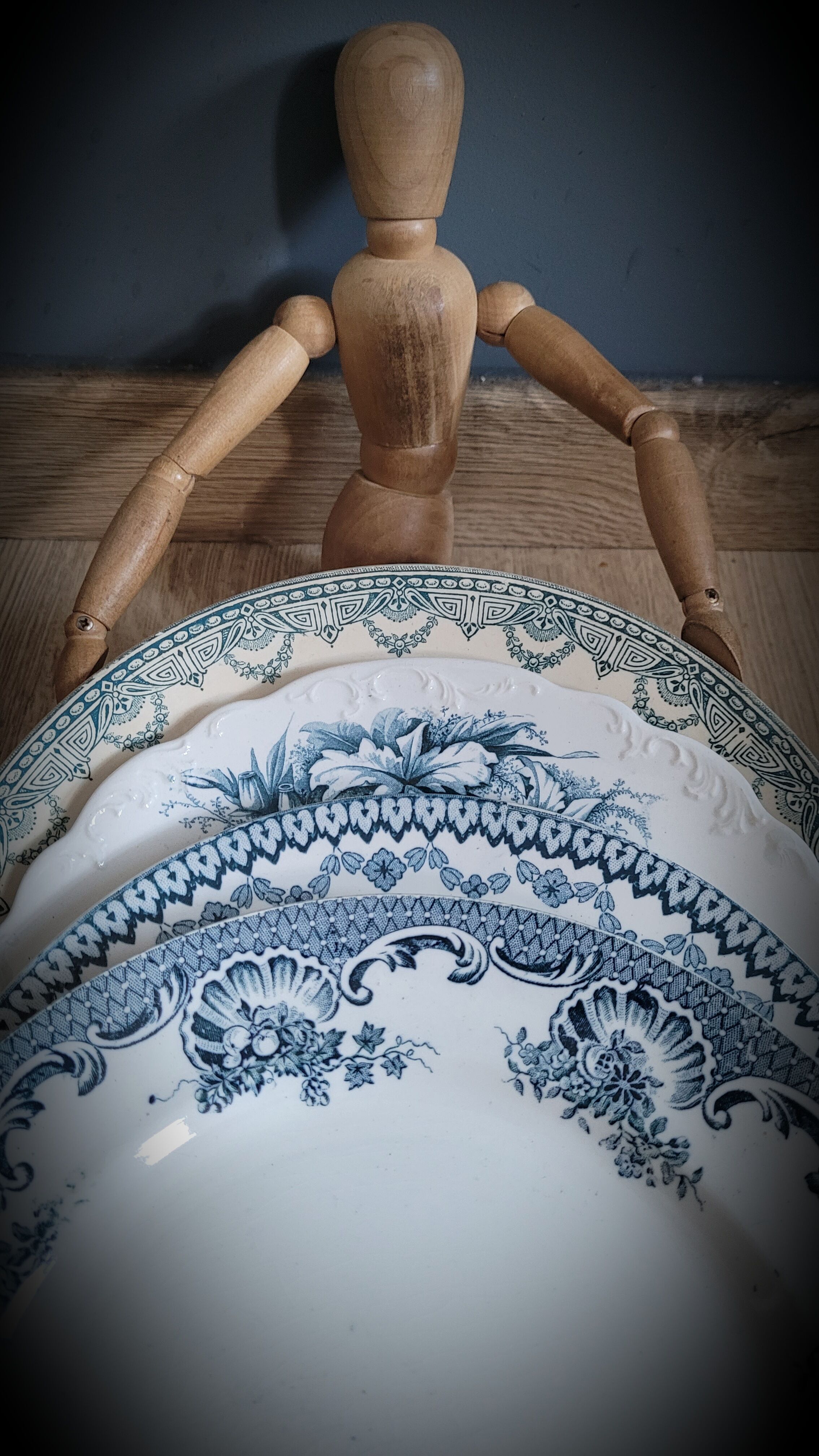 Quartet of mismatched blue plates