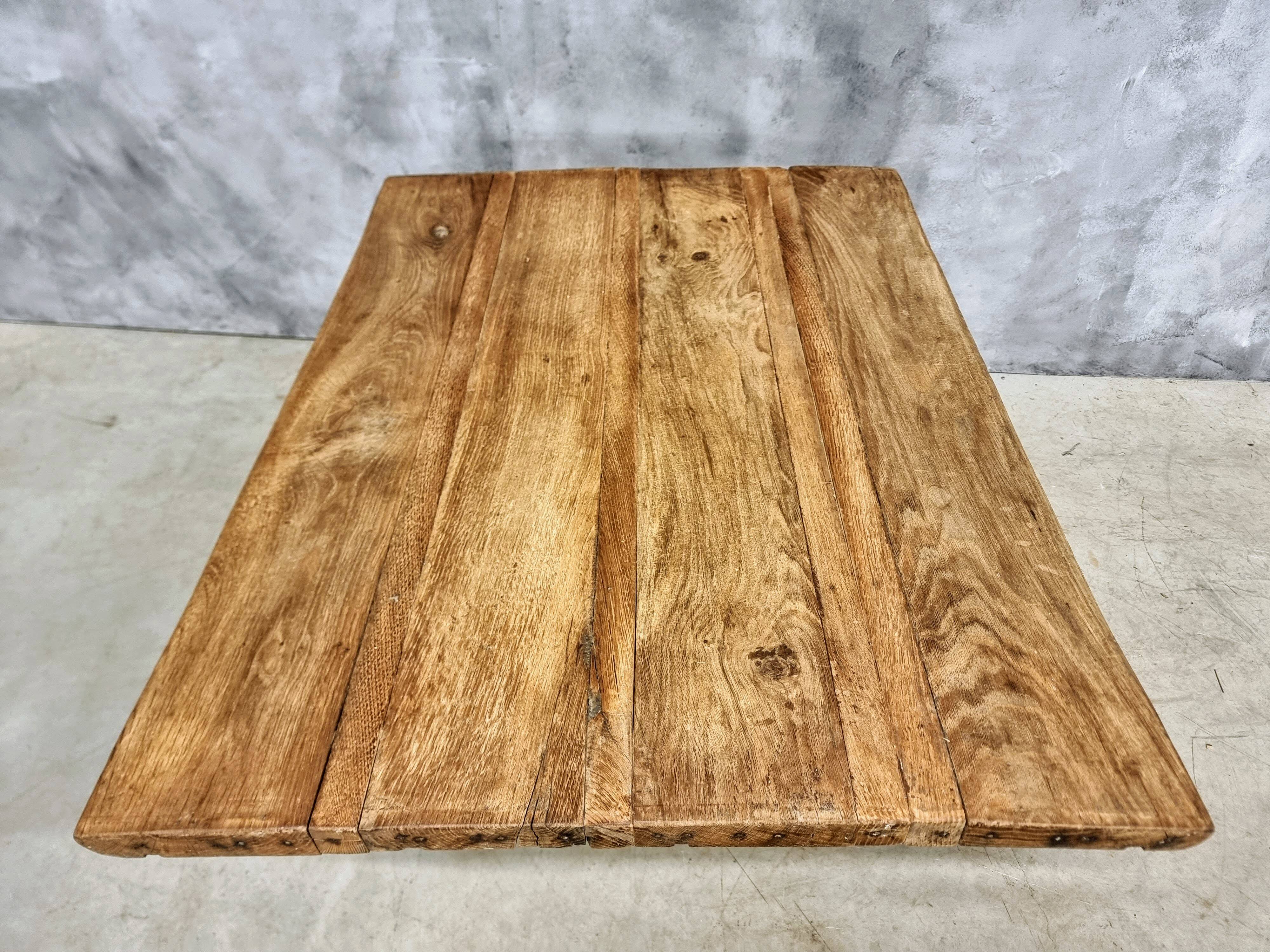 Antique oak dining table on cast iron base 93 x 123 cm
