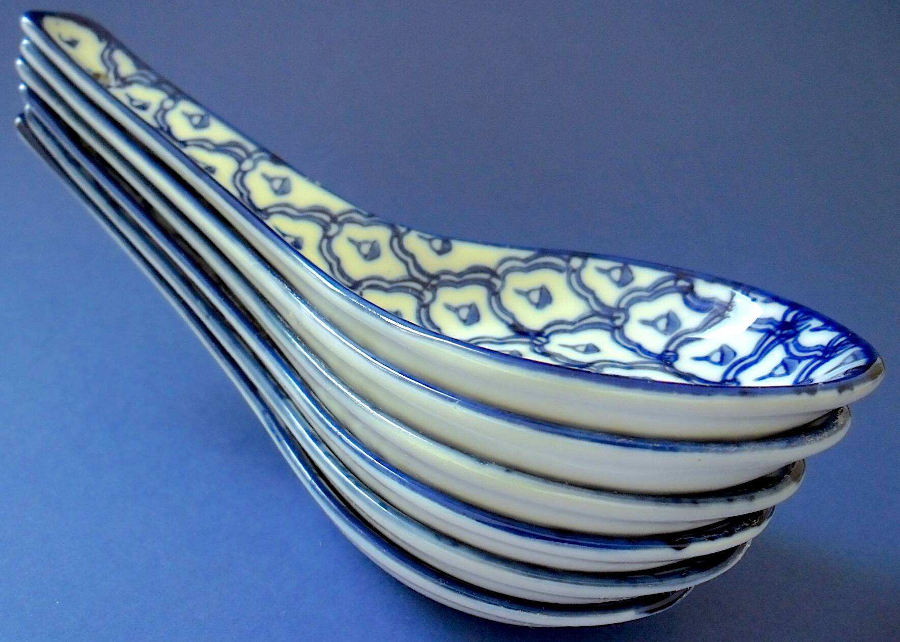 Set of six (6) soup spoons in white-blue porcelain from China