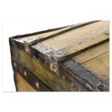 Wooden transport trunk with steel reinforcements