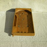 Old nail pinball machine