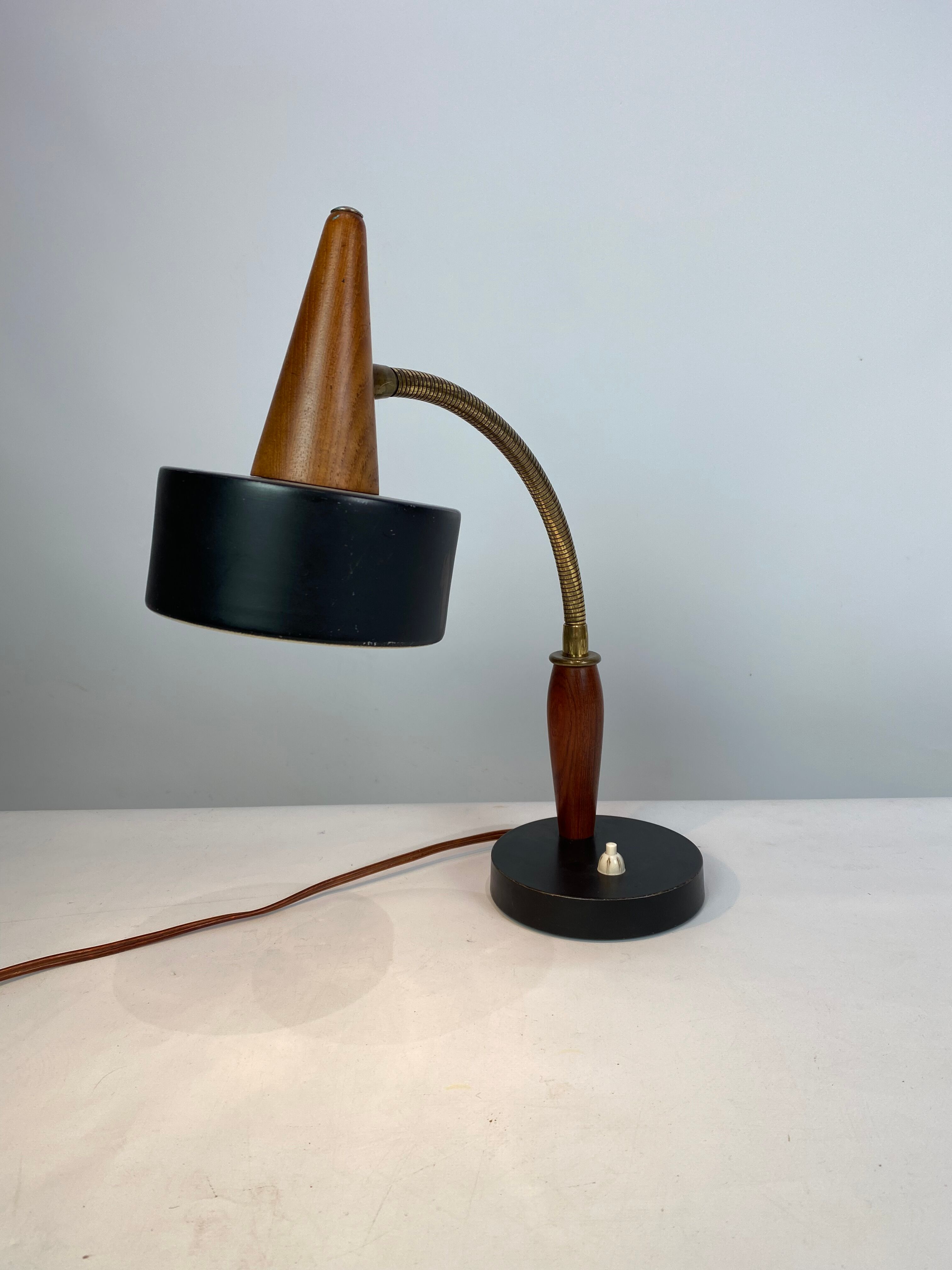 Table lamp of black metal and teak of Danish design, 1960s