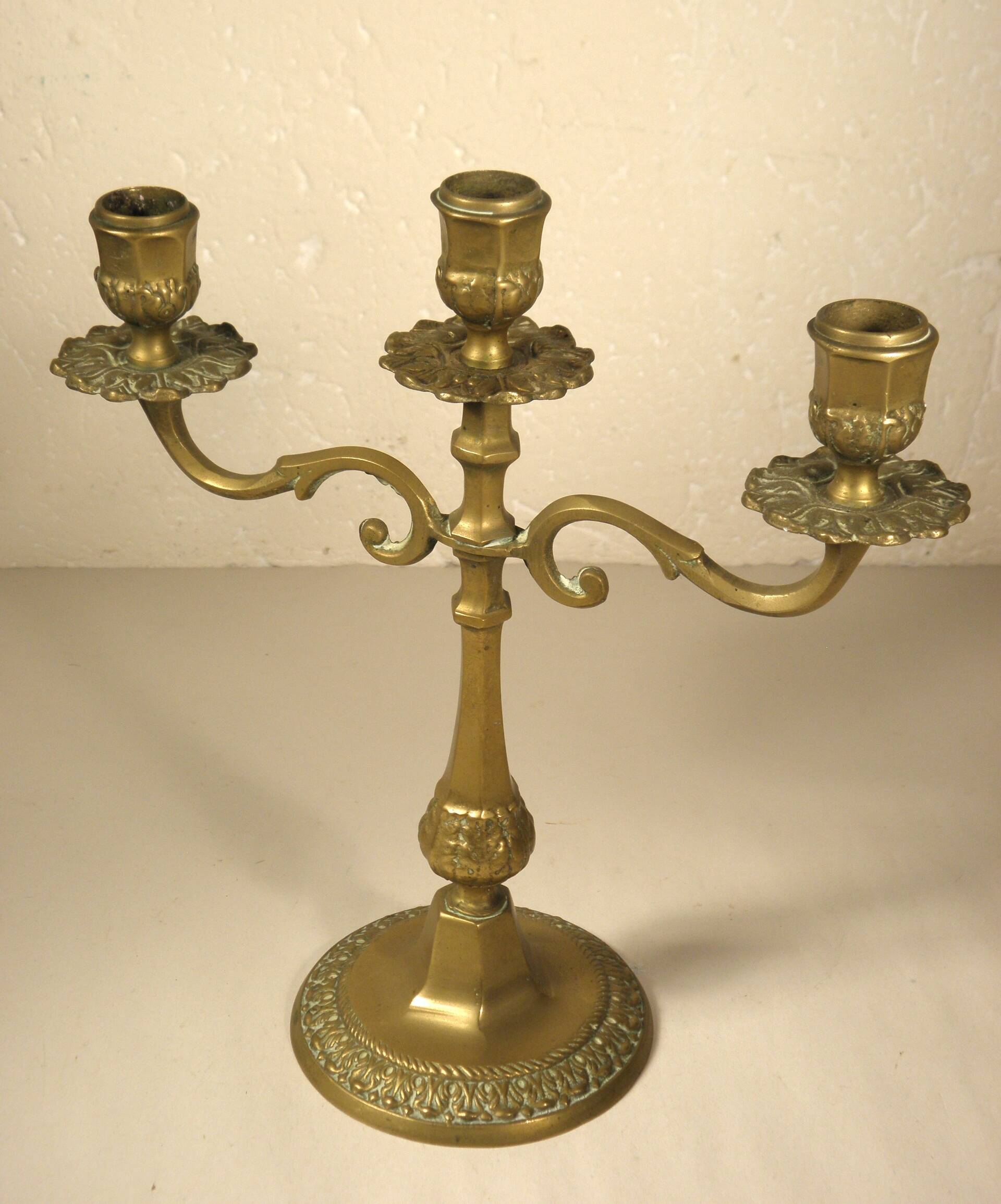 Three-light brass candlestick